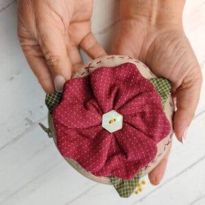 monedero con flor en tres dimensiones